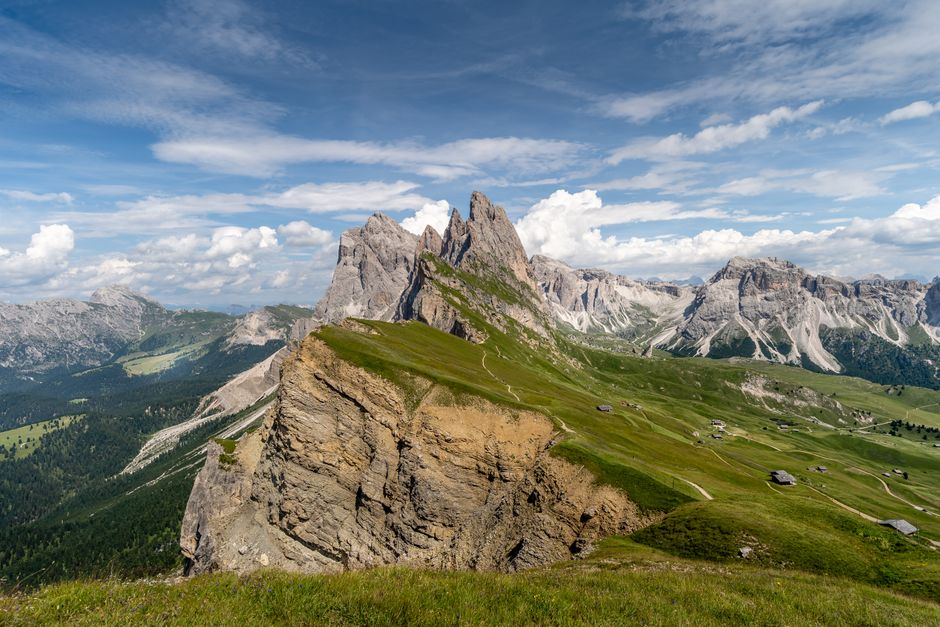 Breathtaking view of the Dolomites peaks in Italy under a blue sky.