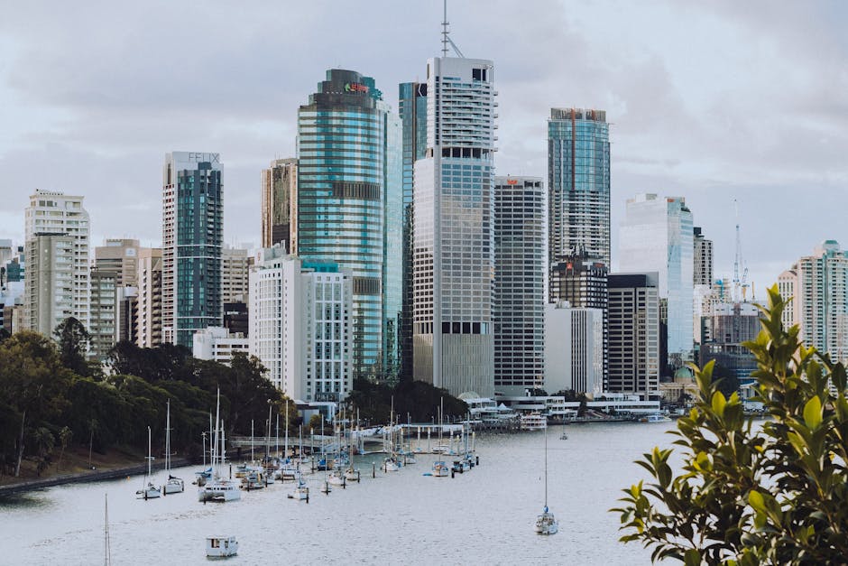 A stunning view of Brisbane's skyline from Kangaroo Point featuring skyscrapers and the waterfront.