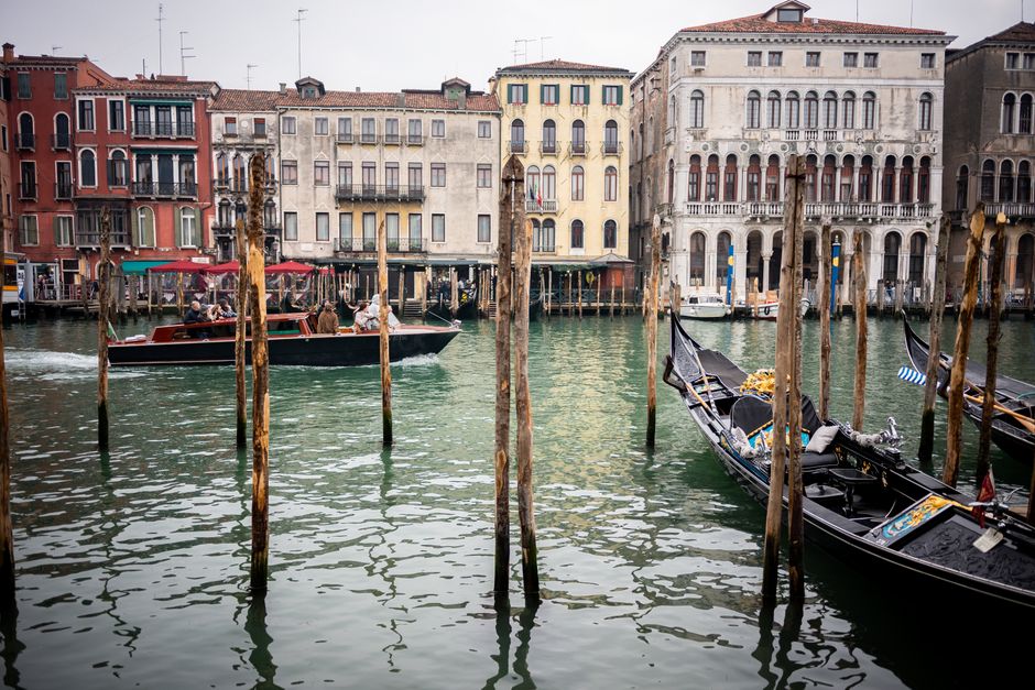 Scenic view of Venice's iconic canals with gondolas and historic architecture in Italy's Veneto region.