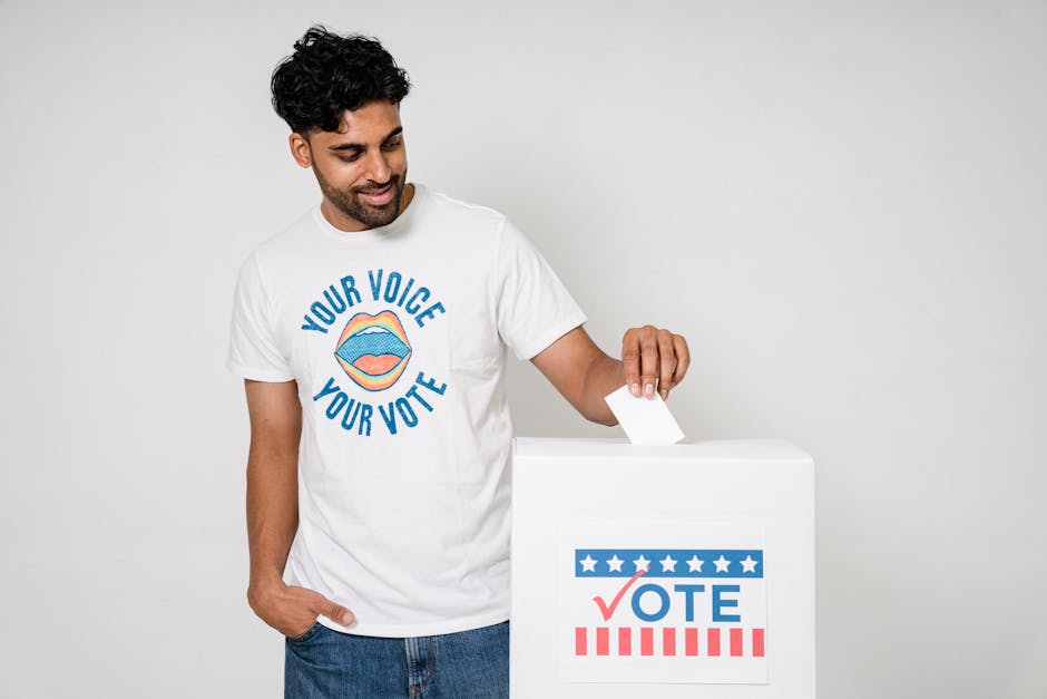 Man casting a vote in an election with a voting ballot box, promoting democratic participation.